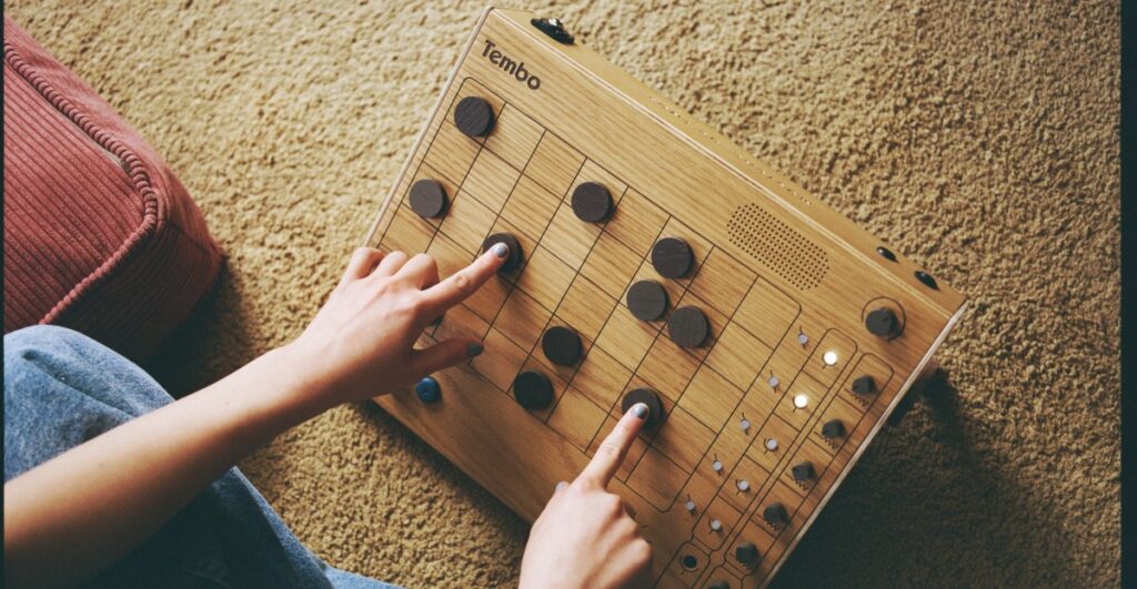 Tembo: An Innovative Drum Machine That Integrates Checkerboard Elements for Playful Music Creation